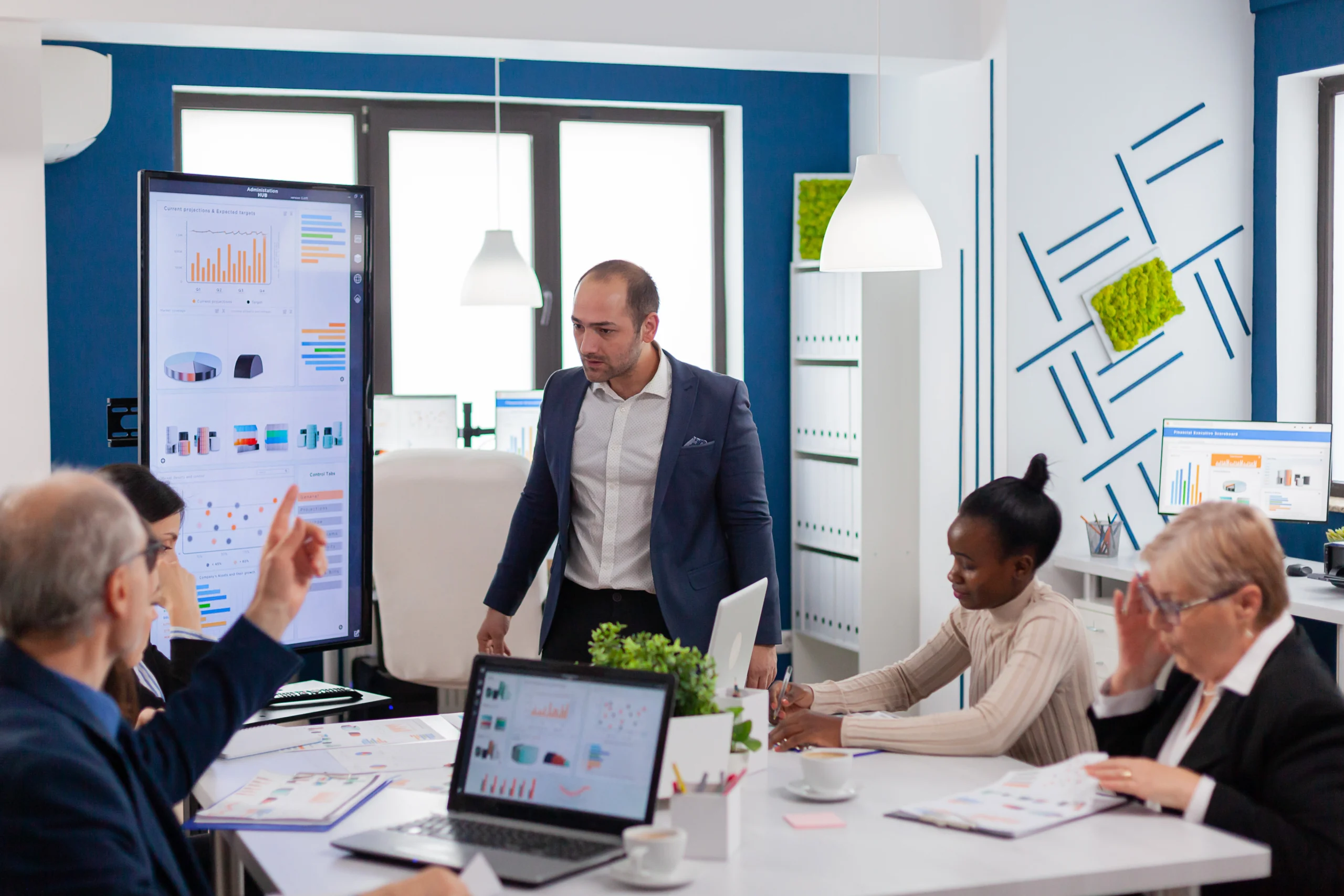 Professionals reviewing quality assurance processes and standards