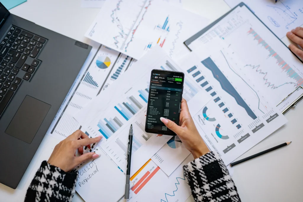 Quality management professional reviewing QMS gaps and required corrective actions